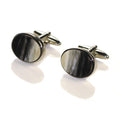 A pair of oval-shaped Abbeyhorn cufflinks with a rhodium handle, displayed against a white background.
