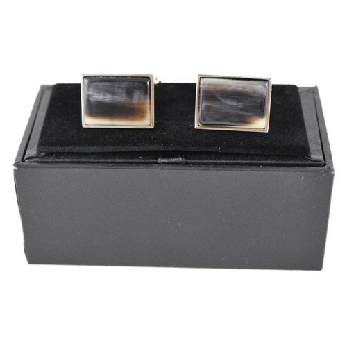 A pair of black rectangular oxhorn cufflinks with a rhodium finish and a swivel barrel design.