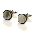 A pair of round Abbeyhorn cufflinks with a rhodium finish and patterned Oxhorn surface, displayed against a white background.