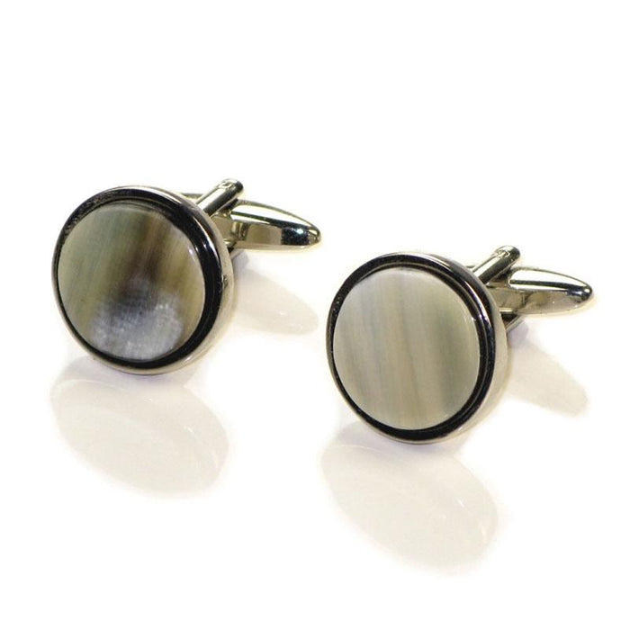 A pair of round Abbeyhorn cufflinks with a rhodium finish and patterned Oxhorn surface, displayed against a white background.