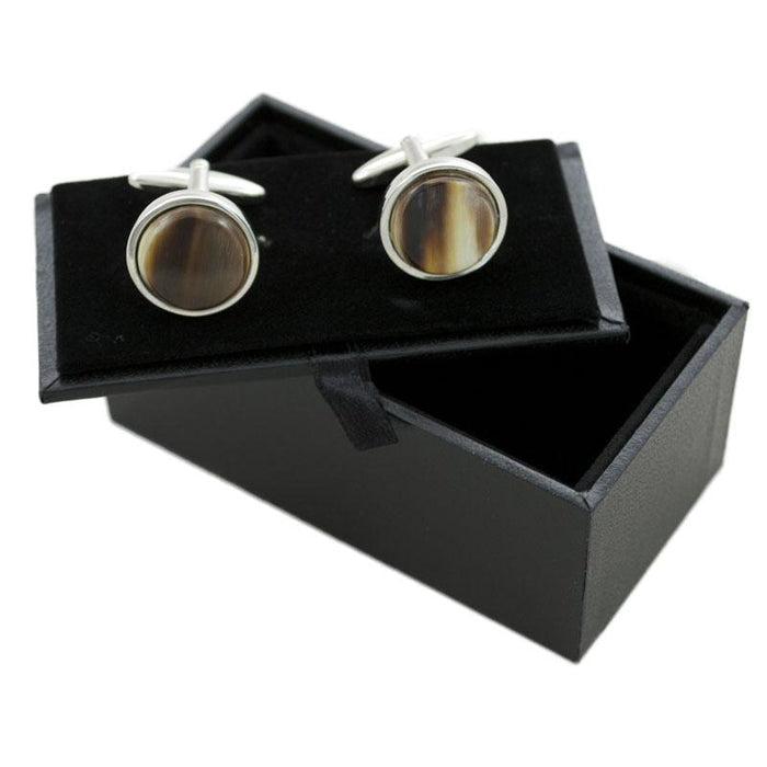 A pair of round Abbeyhorn cufflinks with a rhodium finish and patterned Oxhorn surface, displayed against a white background.