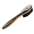 A hand crafted suede brush with a boar bristle head and an oxhorn back attached to a beechwood handle.