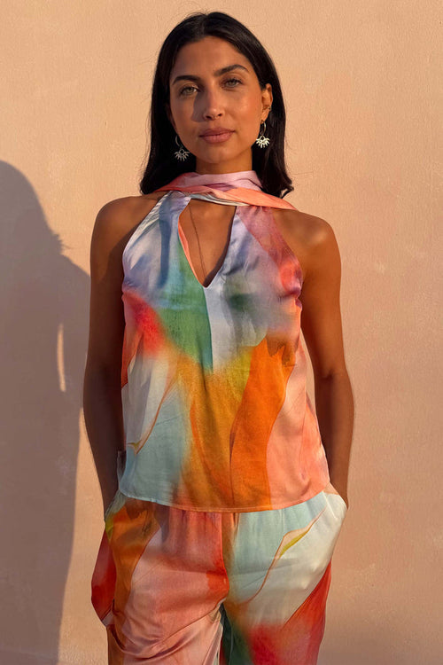 Multicoloured Abstract Lily Top featuring a multi-wear tie neck and soft satin-esque finish.