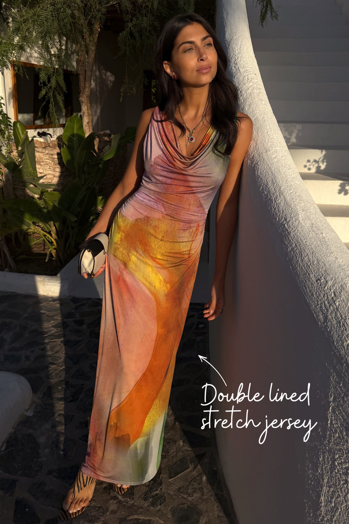 Abstract Malika Dress in multicoloured double lined stretch jersey with a draped neckline.