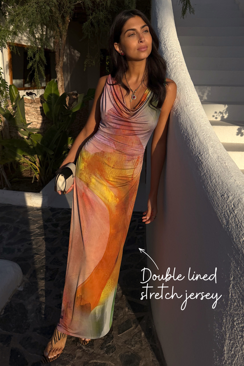 Abstract Malika Dress in multicoloured double lined stretch jersey with a draped neckline.