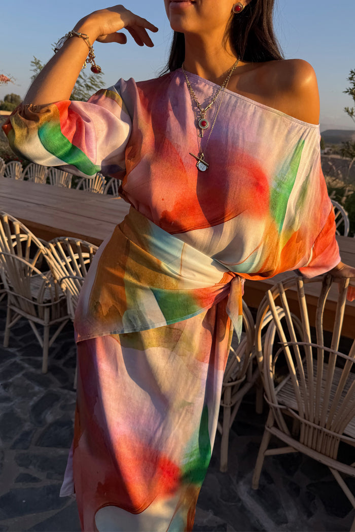 Multi-wear Abstract Scarf styled as a waist tie on a matching dress to create a colourful dopamine dressing look.