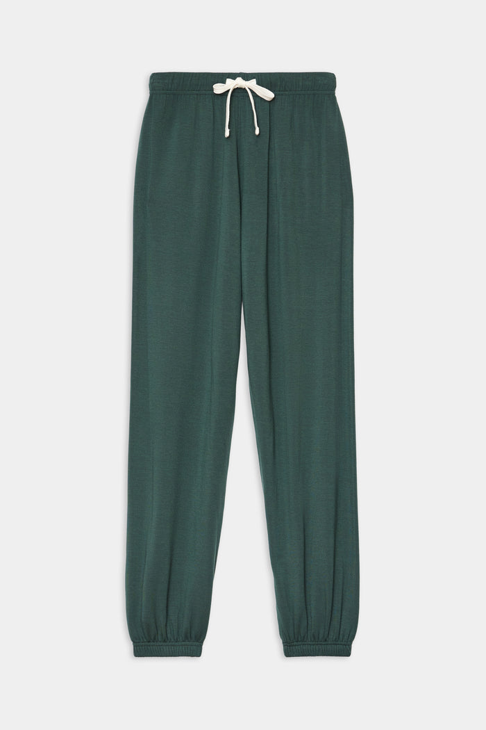 The SPLITS59 Andie Oversized Fleece Sweatpant in Military features an elastic waistband, white drawstring, and elastic cuffs—ideal for cool weather workouts. Shown laid flat on a white background.