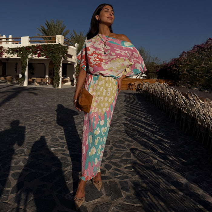 Animal Print Tilly Dress with silver metallic flecks and a multicoloured print, styled for a vacation look.