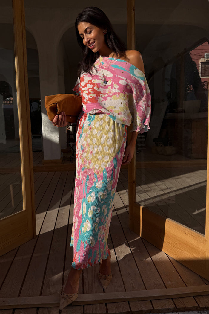 Multicoloured Animal Print Tilly Dress with silver metallic flecks and a pleated skirt, designed in London.