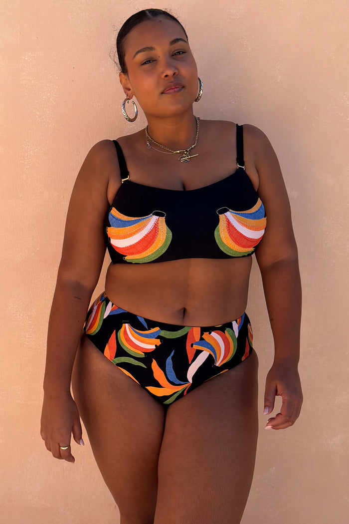 Black Banana Bandeau Bikini Top with colourful embroidered banana motifs, shown on a curve model for inclusive sizing.