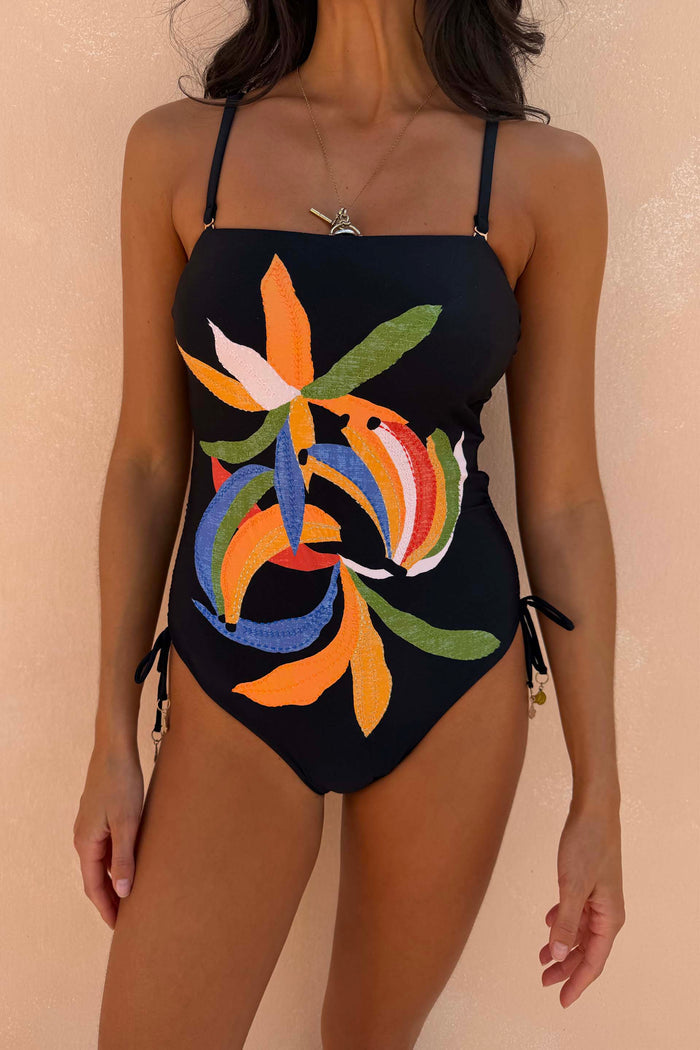 Black Banana Bandeau Swimsuit with colourful embroidered motifs and adjustable ruched tie sides.