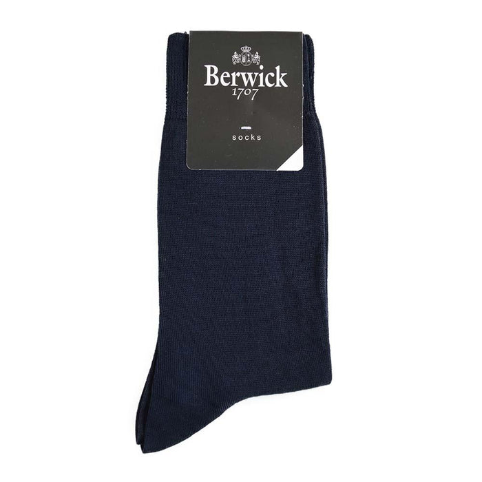 A pair of black Berwick 1707 cotton blend plain socks with the brand tag visible.