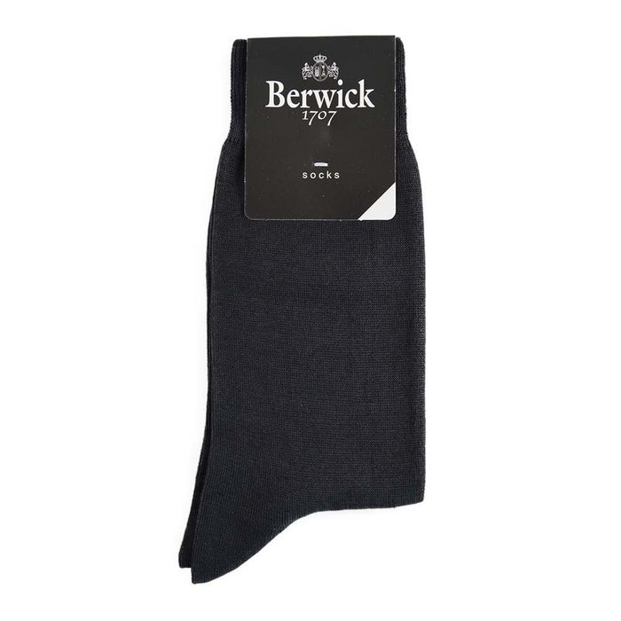 A pair of black Berwick 1707 cotton blend plain socks with the brand tag visible.