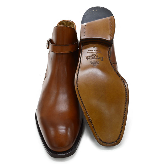 A brown Berwick 1707 JODHPUR 490 ankle boot with a buckle strap and Goodyear welted sole.