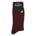 A pair of burgundy ribbed socks with the Berwick 1707 brand tag visible.