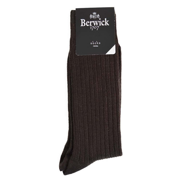 A pair of brown ribbed socks with the Berwick 1707 brand tag visible.