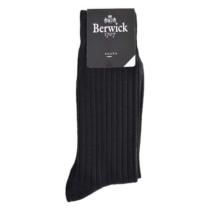 A pair of black ribbed socks with the Berwick 1707 brand tag visible.
