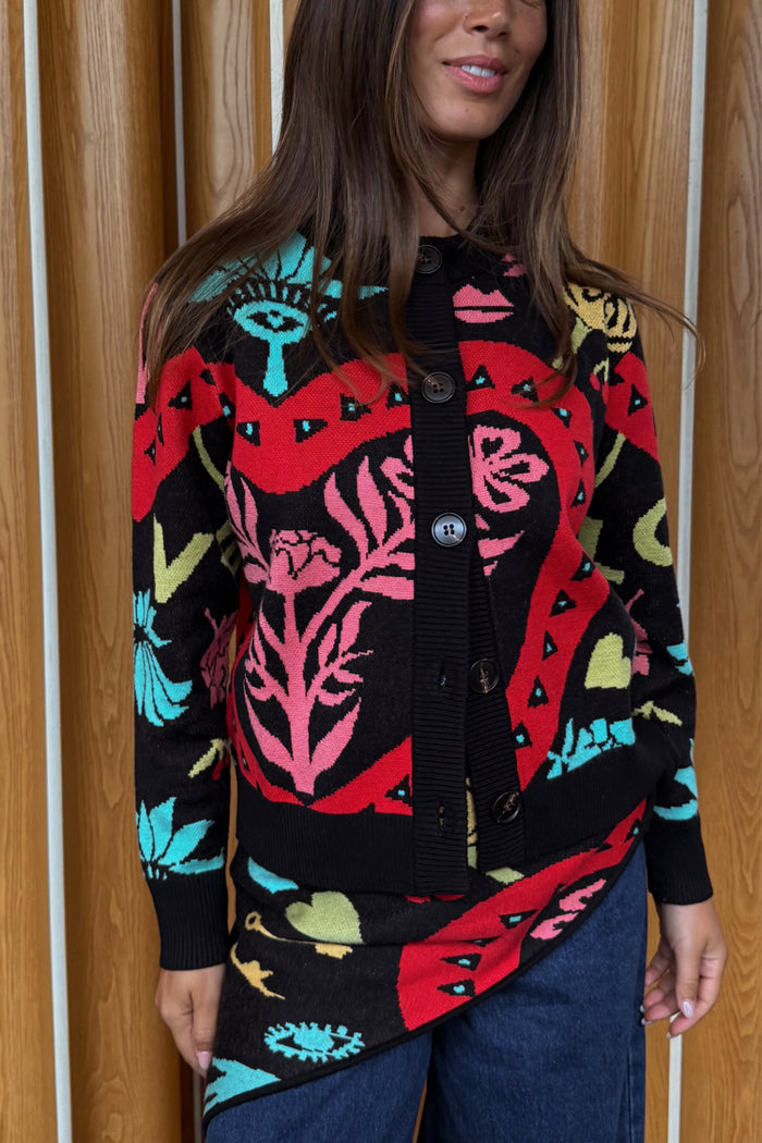 Black Amara Hollie Cardigan designed in-house featuring heart and eye motifs with a button-up front.