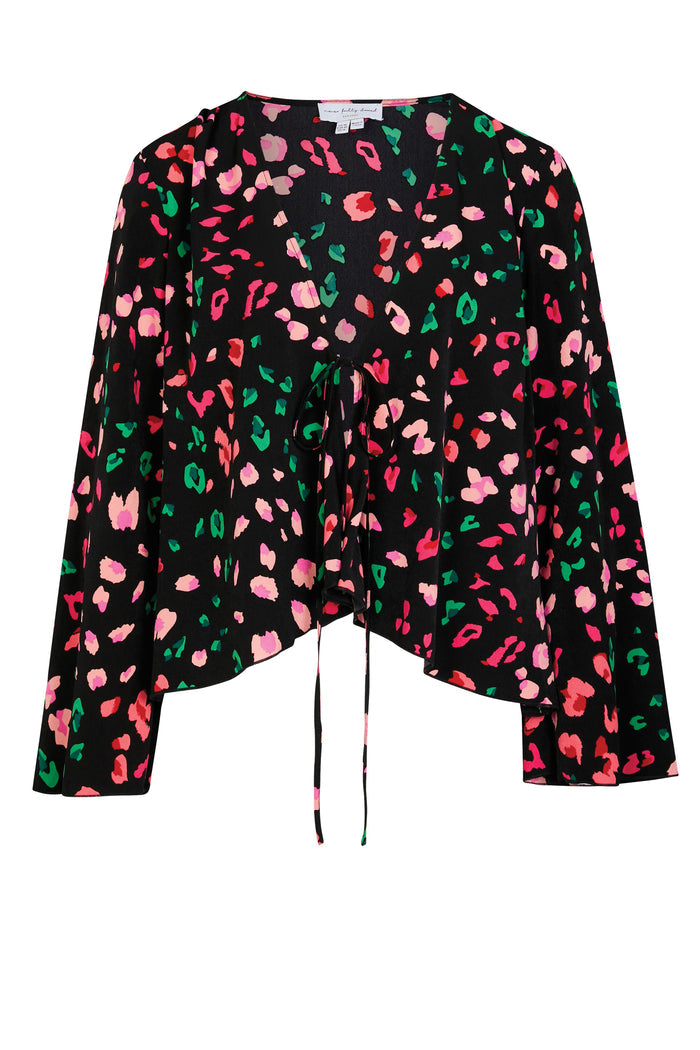 Black animal print Verity top featuring pink and green leopard spots, flared bell sleeves and a centre front tie.