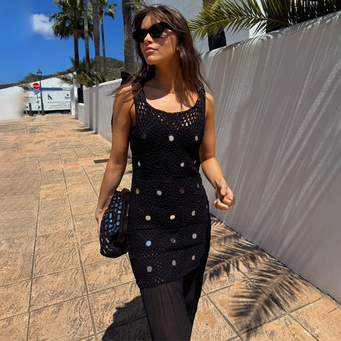 Black Crochet Alicia Dress featuring a sequin-embellished bodice and chiffon skirt, styled for a sunny vacation look.