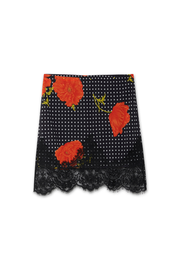 Black Poppy Mini Maeva Skirt featuring a red poppy and polka dot print with a black lace trim.