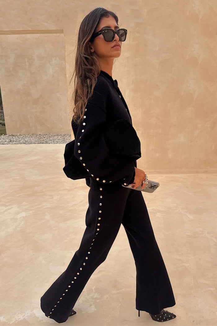 Black Studded Knit Trousers and matching cardigan with silver side studs, styled as a monochrome co-ord on a 5ft4” model.