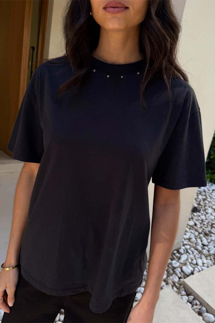 Black cotton T-shirt designed in London featuring silver stud detailing around the neckline.