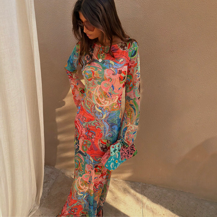 Blue Mari Aria Mesh Dress with a multi-colour paisley print, long sleeves and a midaxi silhouette.