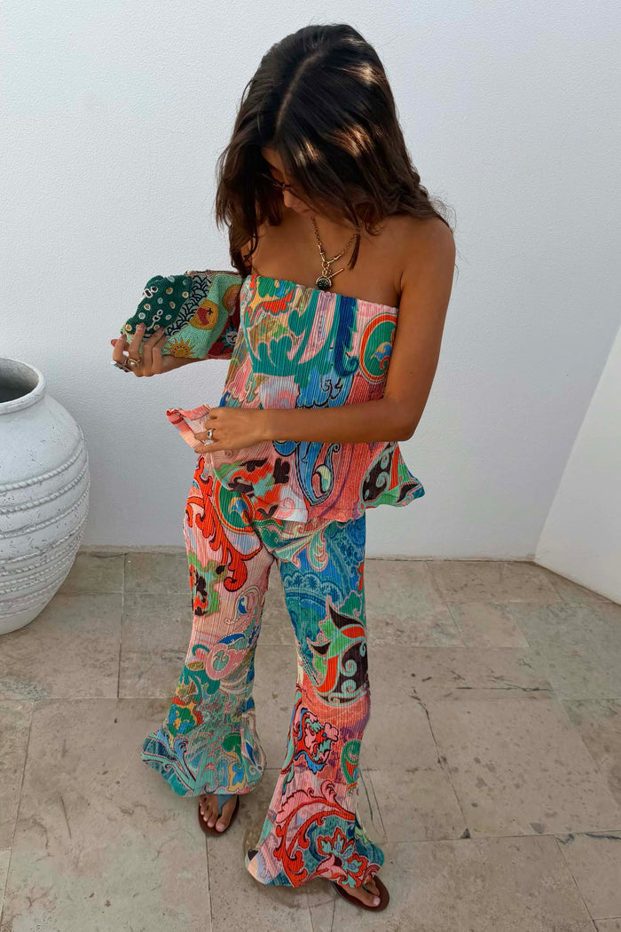 Blue Mari Plisse Trousers in a pastel paisley print, styled as a summer co-ord with a matching bandeau top.