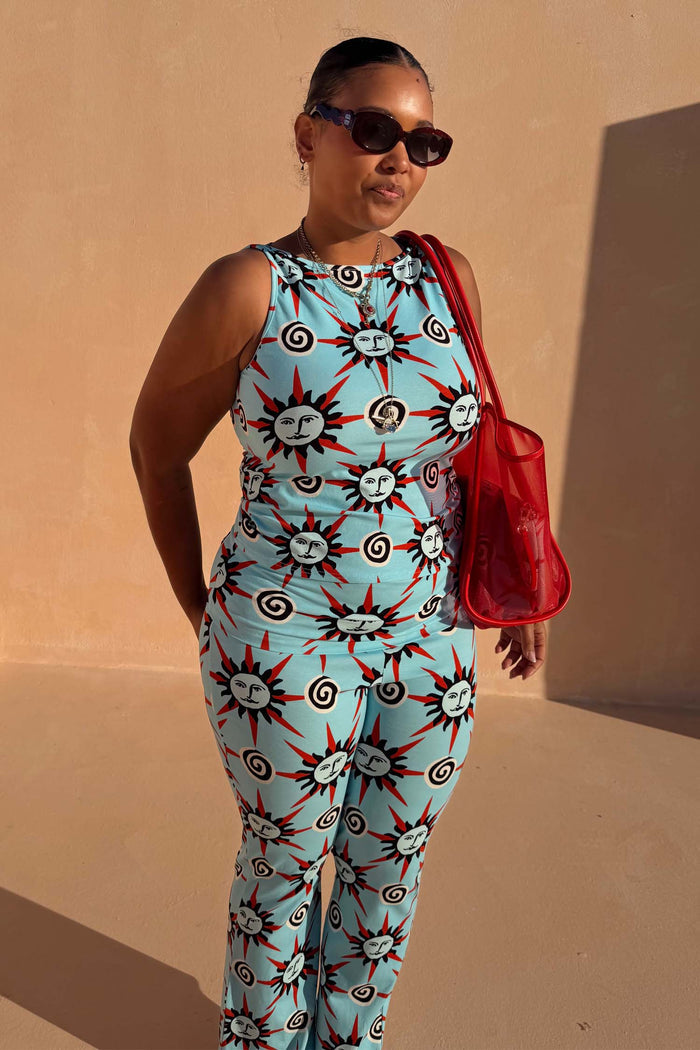Blue Sun Tank Top in soft jersey with sun and swirl motifs, styled as a matching co-ord for inclusive sizing.