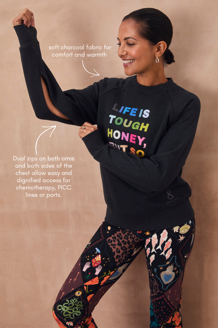Charcoal Life is Tough Honey Sweatshirt with a colourful slogan and functional zips on arms for medical treatment access.