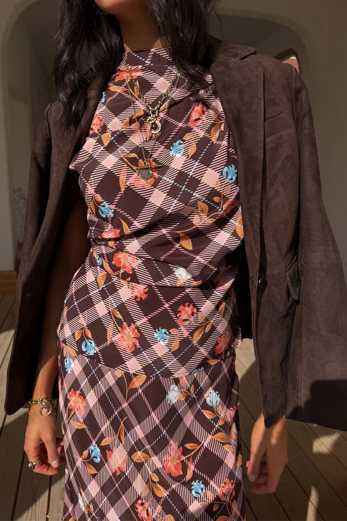 Chocolate Check Floral Top featuring a high neck and floral motifs, styled with a draped brown blazer.
