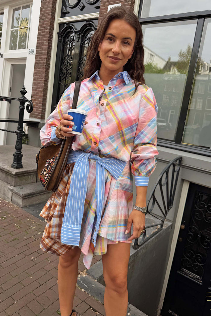 Pastel check cotton shirt with blue stripe accents and a detachable pussy bow tied at the waist for multi-wear styling.