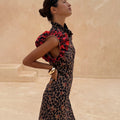 Cherry Leopard Remi Dress with leopard print, red cherry pleated frill sleeves and a high ruffled neck.