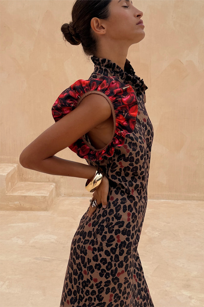 Cherry Leopard Remi Dress with pleated frill sleeves and neckline in the iconic leopard and cherry print.