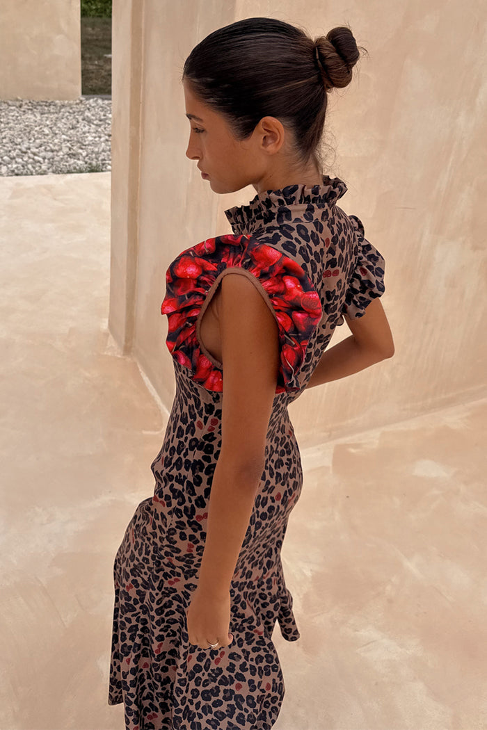 Cherry Leopard Remi midaxi dress with leopard print, red cherry frilled sleeves and a pleated neckline.