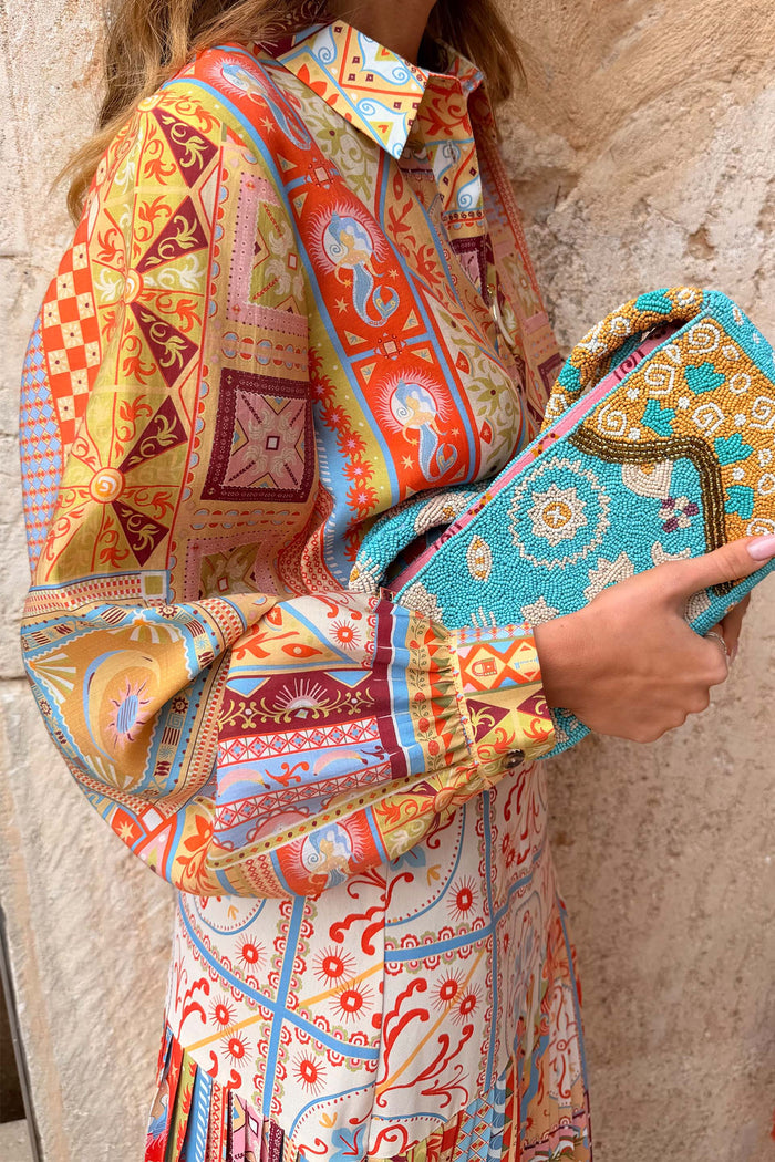 Dolce Vita Marley Shirt featuring a multi-colour patchwork tile print with balloon sleeves and button cuffs.
