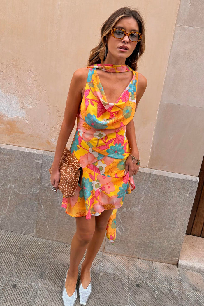Floral Mini Sophie Dress in a retro orange and pink print with a cowl neck, asymmetric hem and detachable scarf.