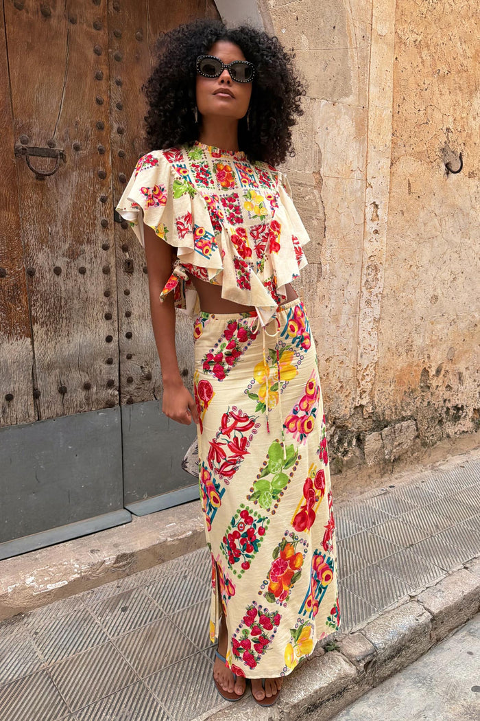 Cream Fruit Stamps Mabel Skirt with a Mediterranean citrus print, cotton-linen blend, and drawstring waist.
