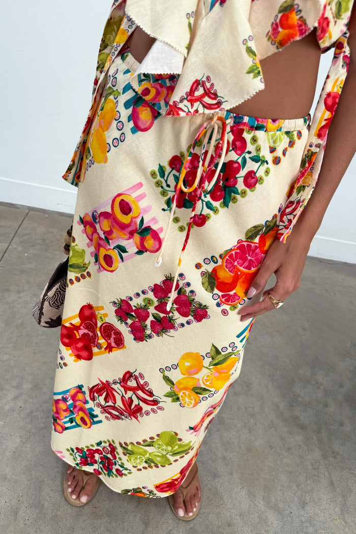 Fruit Stamps Mabel Skirt featuring a Mediterranean-inspired citrus and berry print with a drawstring fastening.