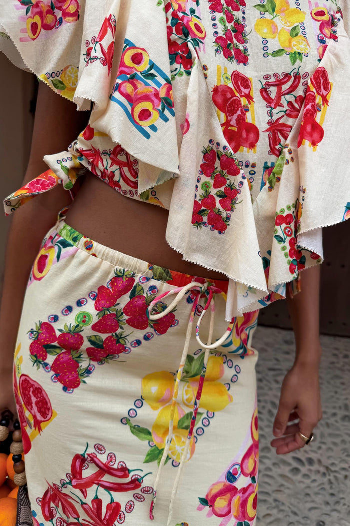 Fruit Stamps Mabel Skirt with a Mediterranean-inspired citrus print and a cream cotton-linen drawstring waist.