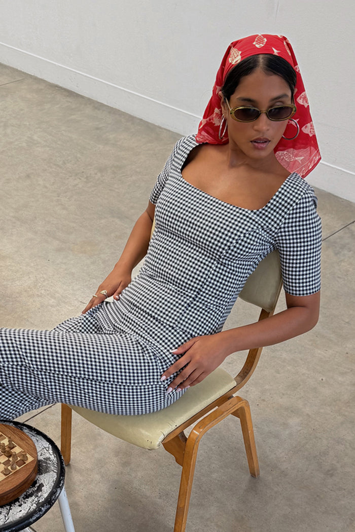 Black and white Gingham Top with a deep square neckline and corset-style darts, paired with matching co-ord trousers.