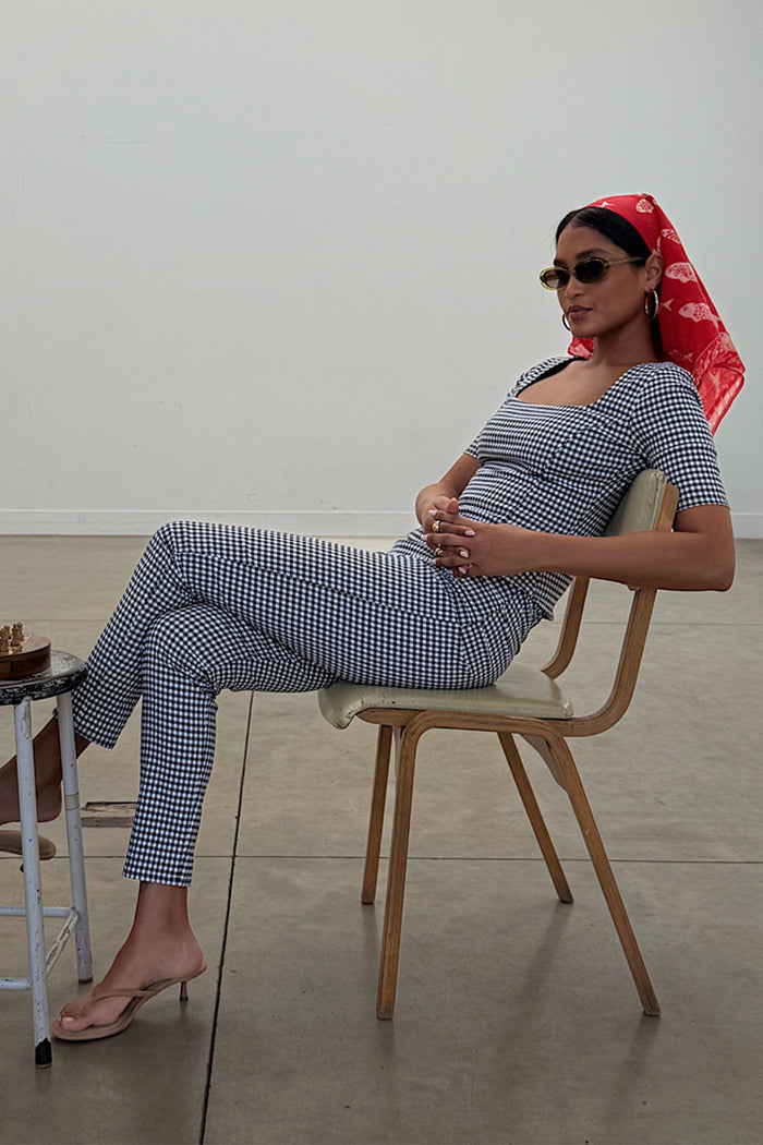 Skinny leg Gingham Trousers and matching top co-ord in monochrome check, styled with a red headscarf.