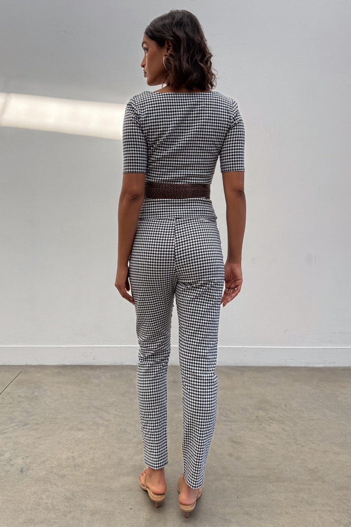 Gingham Trousers and short-sleeve top co-ord in a black and white check with a skinny leg fit, shown from the back.