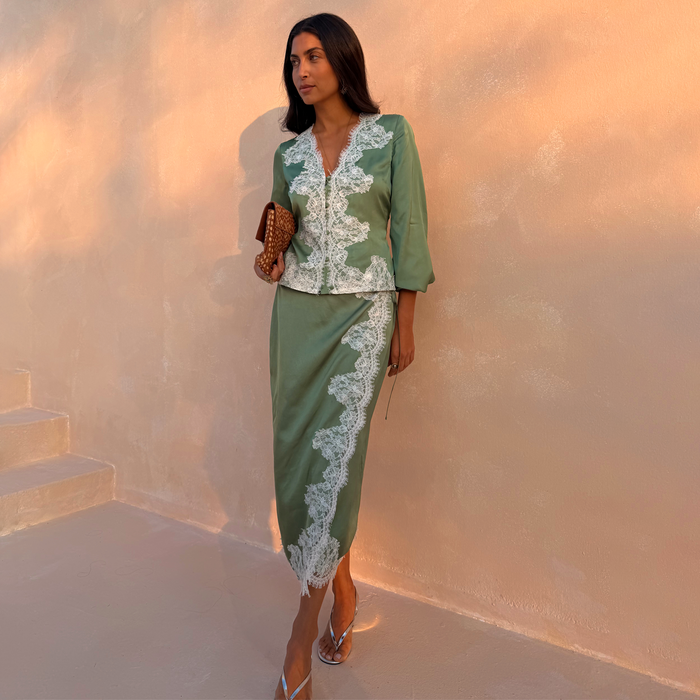Green Lace Wrap Midi Skirt with white lace detailing, styled as a co-ord with a matching long-sleeve top.