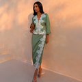 Green Lace Wrap Midi Skirt with white lace detailing, styled as a co-ord with a matching long-sleeve top.