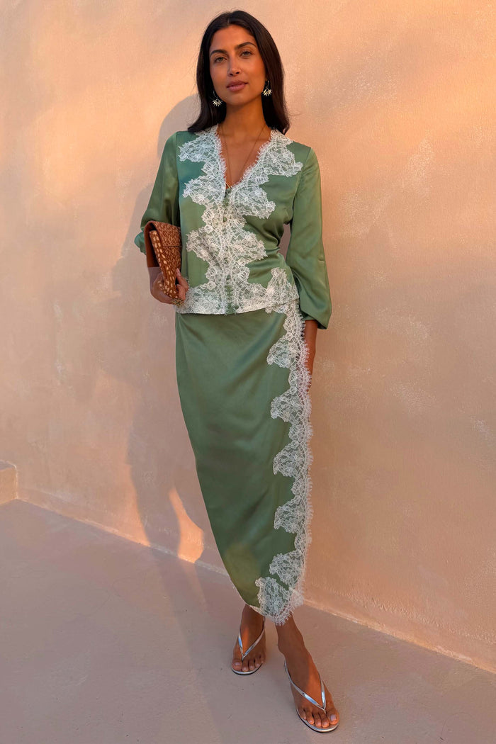Green Lace Wrap Midi Skirt with cascading contrast lace detail, styled as a co-ord for a special occasion.