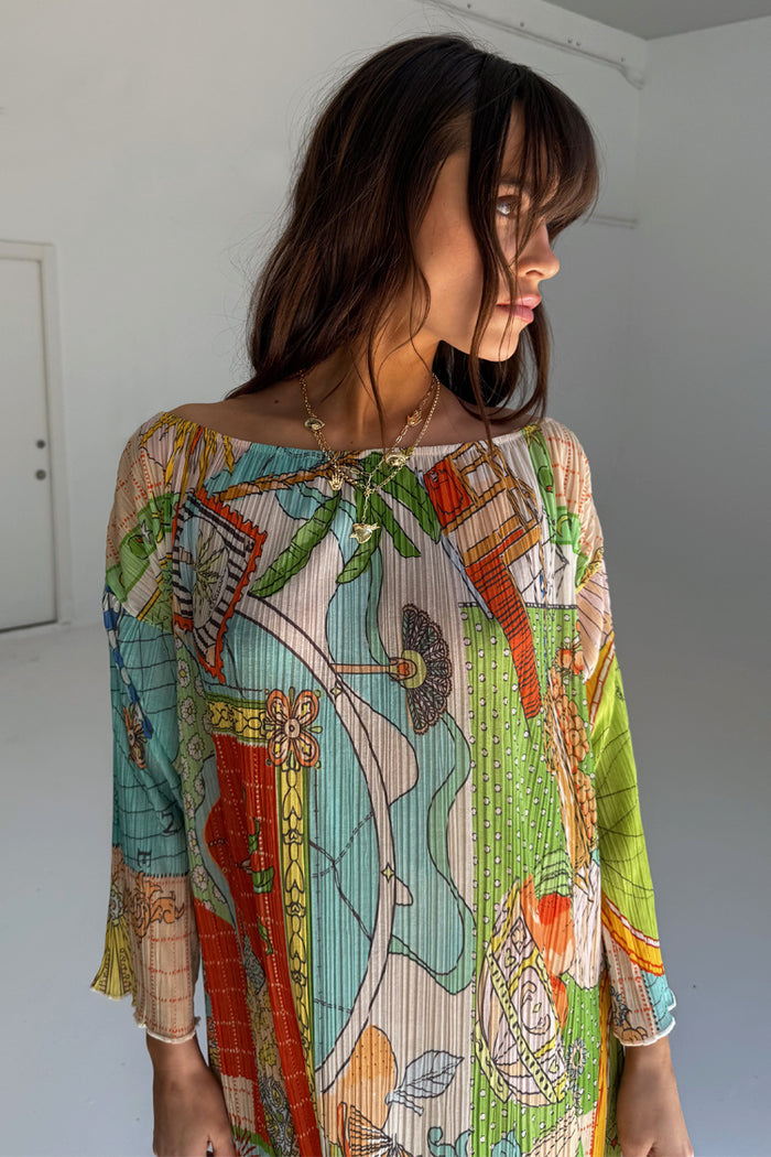 Isla Jem Dress in multi-coloured stretch plisse fabric with hand-painted motifs and a relaxed silhouette.