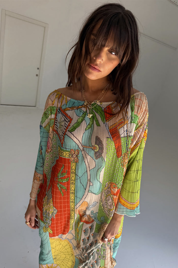 Isla Jem Dress in multi-colour stretch plisse fabric with hand-painted motifs and a relaxed silhouette.
