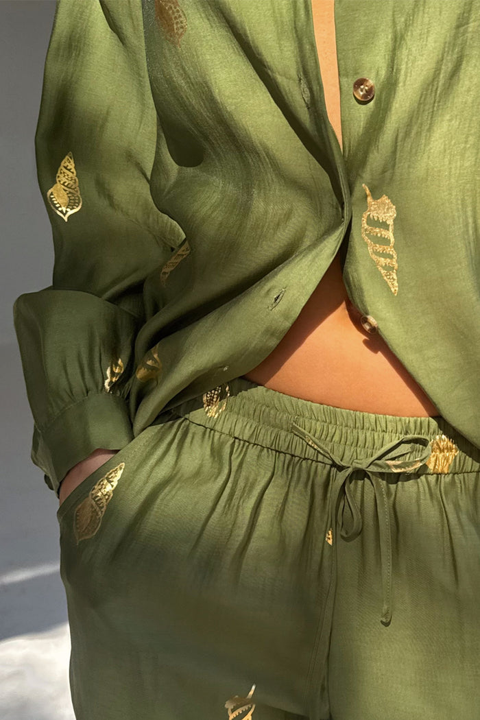 Khaki Shell Trousers and matching shirt featuring a gold shell print and an elasticated drawstring waist.